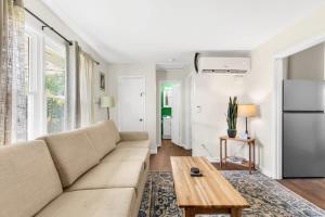 a living room with a couch and a table at The Bricks - Apt 4 in Birmingham