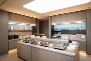 Una cocina o kitchenette en Ji Hotel Shenyang Consulate Sanjing Street