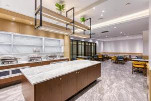 Kjøkken eller kjøkkenkrok på Hanting Hotel Hangzhou Zhejiang University Of Technology