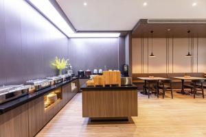 Restorāns vai citas vietas, kur ieturēt maltīti, naktsmītnē Hanting Hotel Xuzhou Dacheng Logistics Park