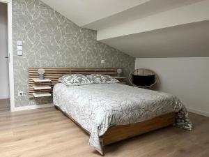 Postel nebo postele na pokoji v ubytování Spacieux appartement neuf au cœur de Bisca plage