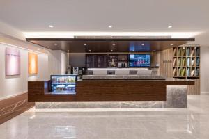 Lobby alebo recepcia v ubytovaní Hanting Premium Hotel Hefei Binhu Wanda City Metro Station