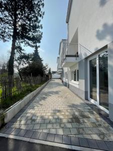 a brick road in front of a building at MaMaM´s Apartment in Kappel-Grafenhausen