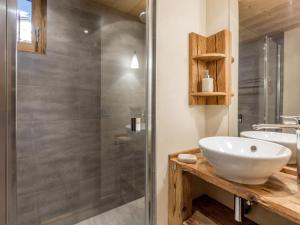 a bathroom with a sink and a shower at Appartement La Clusaz, 2 pièces, 5 personnes - FR-1-304-149 in La Clusaz