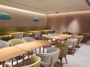 Restavracija oz. druge možnosti za prehrano v nastanitvi Ji Hotel Jinzhou Red Star Macalline