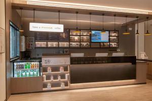 a cosmetics store with a counter with products in it at Hanting Hotel Cixian Yizhong in Cizhou