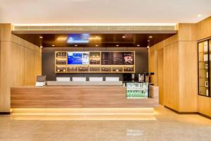 Lobbyn eller receptionsområdet på Hanting Premium Hotel Changchun Hongqi Street Wanda