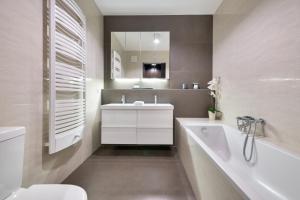 Kúpeľňa v ubytovaní Dom & House - Apartamenty Nadmorski Dwór
