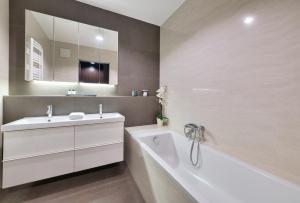 Kúpeľňa v ubytovaní Dom & House - Apartamenty Nadmorski Dwór