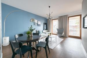 Posedenie v ubytovaní Dom & House - Apartamenty Nadmorski Dwór