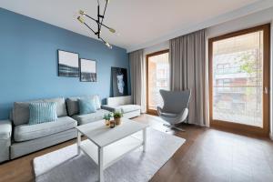 Posedenie v ubytovaní Dom & House - Apartamenty Nadmorski Dwór