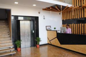 The lobby or reception area at Balaji gold inn hotel
