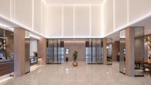 Lobbyen eller receptionen på Hanting Premium Hotel Jinan Heping Road