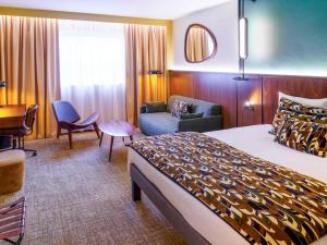 Postel nebo postele na pokoji v ubytování Novotel Avignon Nord