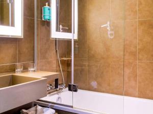 Koupelna v ubytování Novotel Avignon Nord