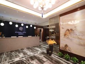 Lobbyen eller receptionen på Starway Hotel Jiamusi Guangfu Road