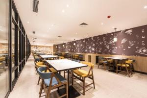 Restoranas ar kita vieta pavalgyti apgyvendinimo įstaigoje Hanting Premium Hotel Linfen Gulou West Street