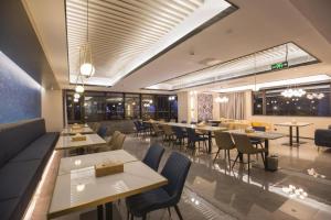 מסעדה או מקום אחר לאכול בו ב-Starway Hotel Wenzhou Wangjiang East Road