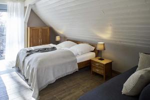 Säng eller sängar i ett rum på Alte Scheune