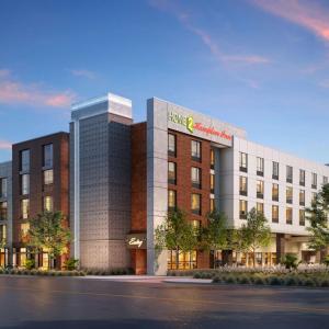 a rendering of a hotel with a building at Hampton Inn Austin East Side in Austin