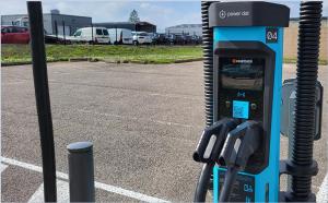 a pay phone in a parking lot next to a parking lot at hotelF1 Chaumont in Chaumont