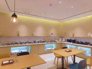 ห้องอาหารหรือที่รับประทานอาหารของ City Comfort Inn Golmud City Hall Yanhu Square