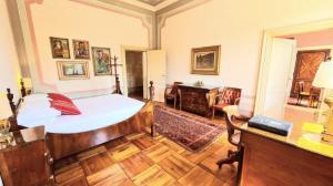 Postel nebo postele na pokoji v ubytování Castello di Lispida