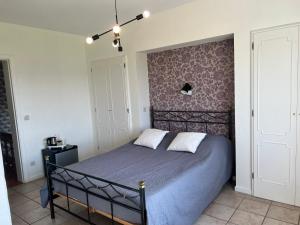 Letto o letti in una camera di Oneux Village