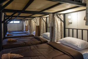 Postel nebo postele na pokoji v ubytování Hug pai hostel