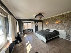 Letto o letti in una camera di Oneux Village