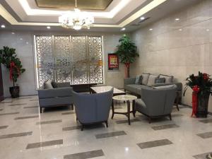De lobby of receptie bij Starway Hotel Changji Qitai Bus Station