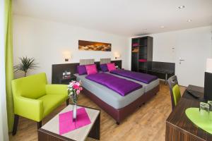 Postel nebo postele na pokoji v ubytování Hotel Gästehaus Stock Zimmer Brotkörble