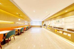 En restaurang eller annat matställe på Hanting Premium Hotel Jilin Tianjin Street