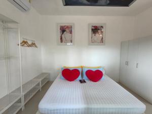 Postel nebo postele na pokoji v ubytování HUG STATION KHAOYAI