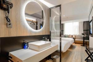 Ванная комната в NIHAO Hotel Lanzhou Xiguan Zhengning Road