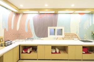 Кухня или мини-кухня в Hanting Hotel Tianjin Tianta Metro Station
