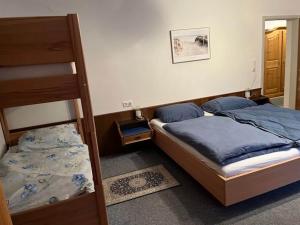 Ένα ή περισσότερα κρεβάτια σε δωμάτιο στο Holiday Home in Lengdorf near Ski Slopes
