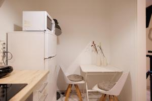 Kuchyň nebo kuchyňský kout v ubytování Zampeli Apartment