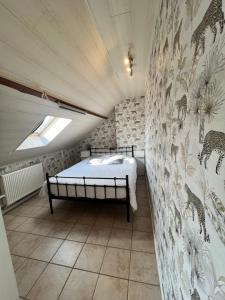 Letto o letti in una camera di Oneux Village