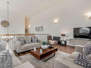 a living room with two couches and a coffee table at 4 Bed in Middleton-in-teesdale 94274 in Middleton in Teesdale