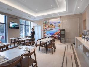 Restoran ili drugo mesto za obedovanje u objektu Vienna Hotel Jiangsu Suining Qingnian Road