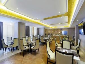 Restoran ili drugo mesto za obedovanje u objektu Vienna Hotel Jiangxi Shangrao High-Speed Railway Station