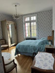 Säng eller sängar i ett rum på Castel Saint Laurent