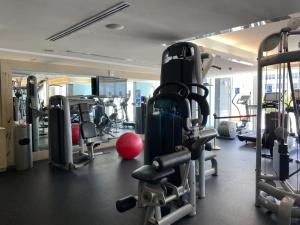 a gym with lots of treadmills and machines at SuitesRUs At W Hotel Fort Lauderdale in Fort Lauderdale