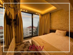 Postel nebo postele na pokoji v ubytování Raj Hotel + 21 fotografií