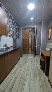 Kuchyň nebo kuchyňský kout v ubytování Dkd-bridge Hotel