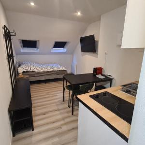 Kuchyň nebo kuchyňský kout v ubytování Kimme green - plein centre ancien