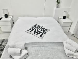 Letto o letti in una camera di Domus Euclide
