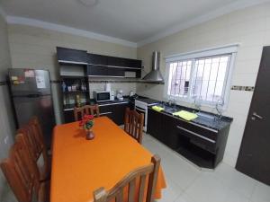 Η κουζίνα ή μικρή κουζίνα στο Duplex Yrigoyen A