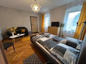 Postel nebo postele na pokoji v ubytování ARTHOME